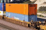 DTTX 728063-B with Schneider and Pacer Stack Train containers at Cajon CA. 10/31/2009